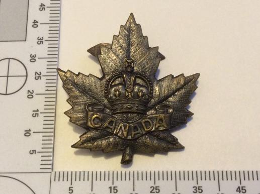 Gradia Militaria - WW1 C.E.F General List Cap Badge, pickled finish, rear blades