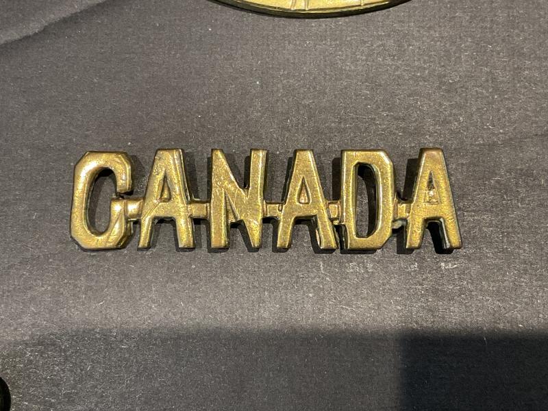 Gradia Militaria - WW1 C.E.F voided CANADA shoulder title