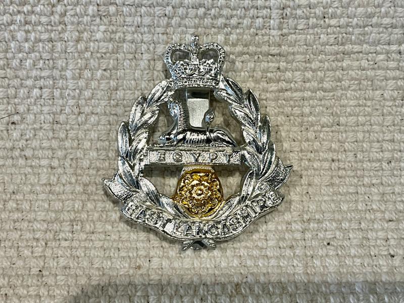 Gradia Militaria - Anodised East Lancashire Regiment cap badge