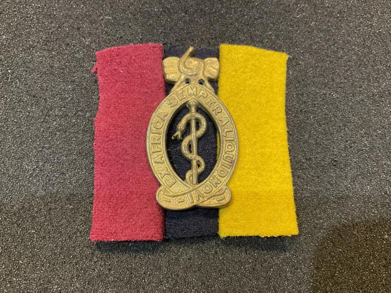 Gradia Militaria - WW2 East Africa Medical Corps cap badge & backing