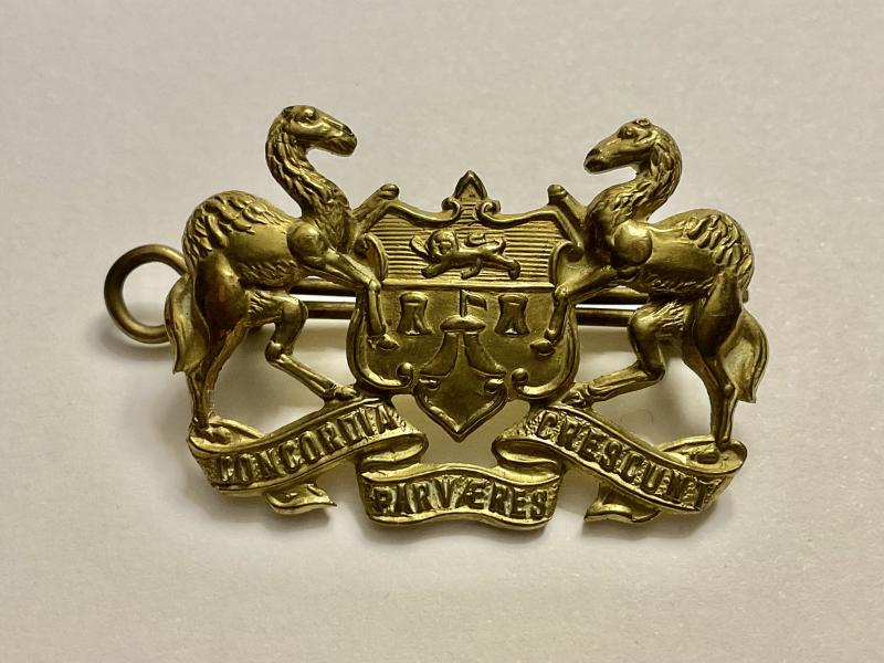 Gradia Militaria - Merchant Taylors school O.T.C brass cap badge.