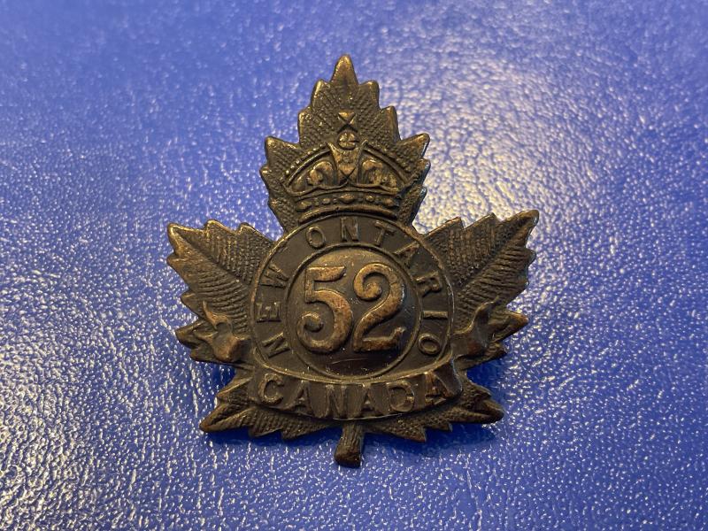 Gradia Militaria - WW1 C.E.F 52nd Infantry Battalion New Ontario cap badge.