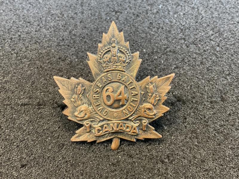 Gradia Militaria - WW1 C.E.F 64th Infantry Battalion cap badge.