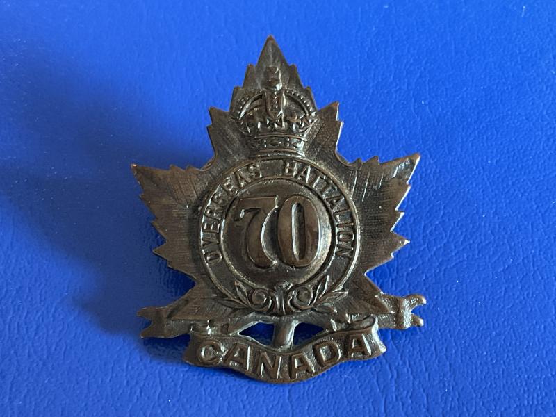 Gradia Militaria - WW1 C.E.F 70th Infantry Battalion cap badge.