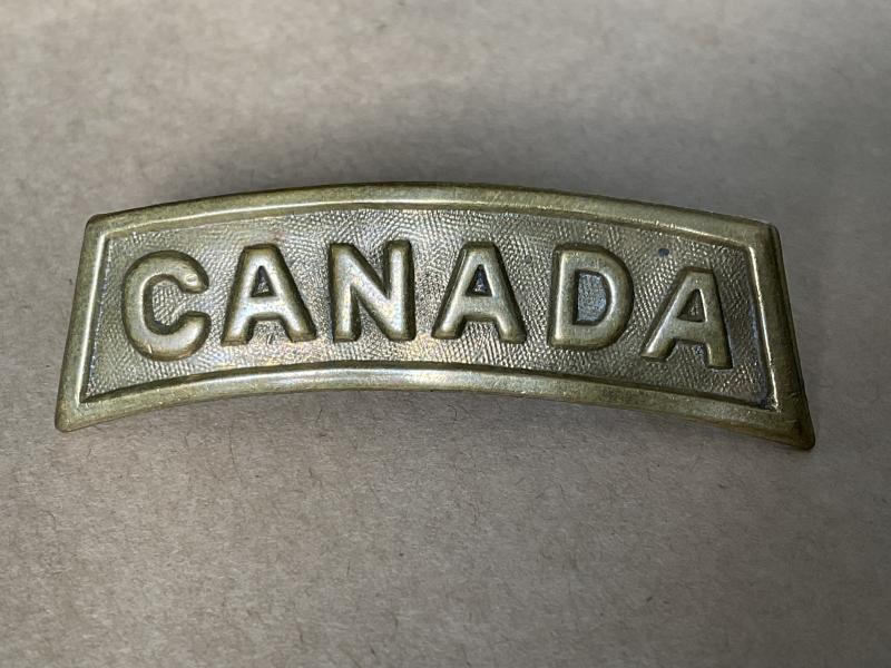 Gradia Militaria - WW1 CANADA brass title stamped CARON BROS MONTREAL 1916.
