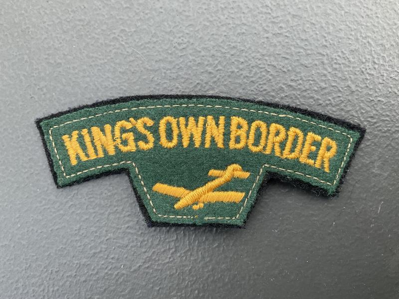 Gradia Militaria - KINGS OWN BORDER cloth shoulder title.