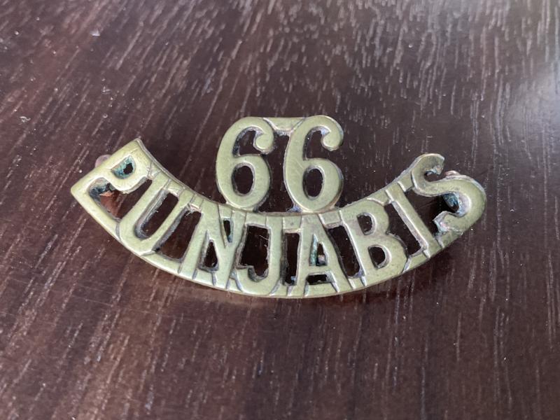 Gradia Militaria - WW1 Indian Army 66th Pajputs Regt brass shoulder title.