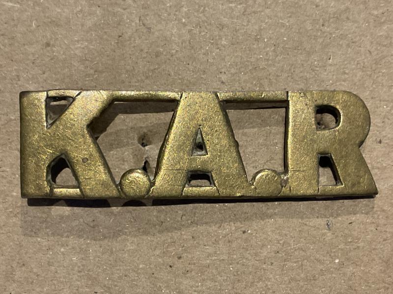 Gradia Militaria - K.A.R (Kings African Rifles) brass shoulder title.