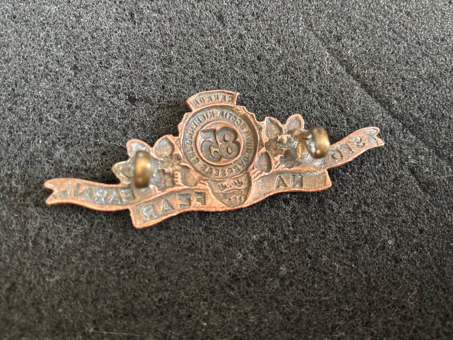 WW1 CEF 85th Inf Battalion Nova Scotia Highlander scroll design collar badge.