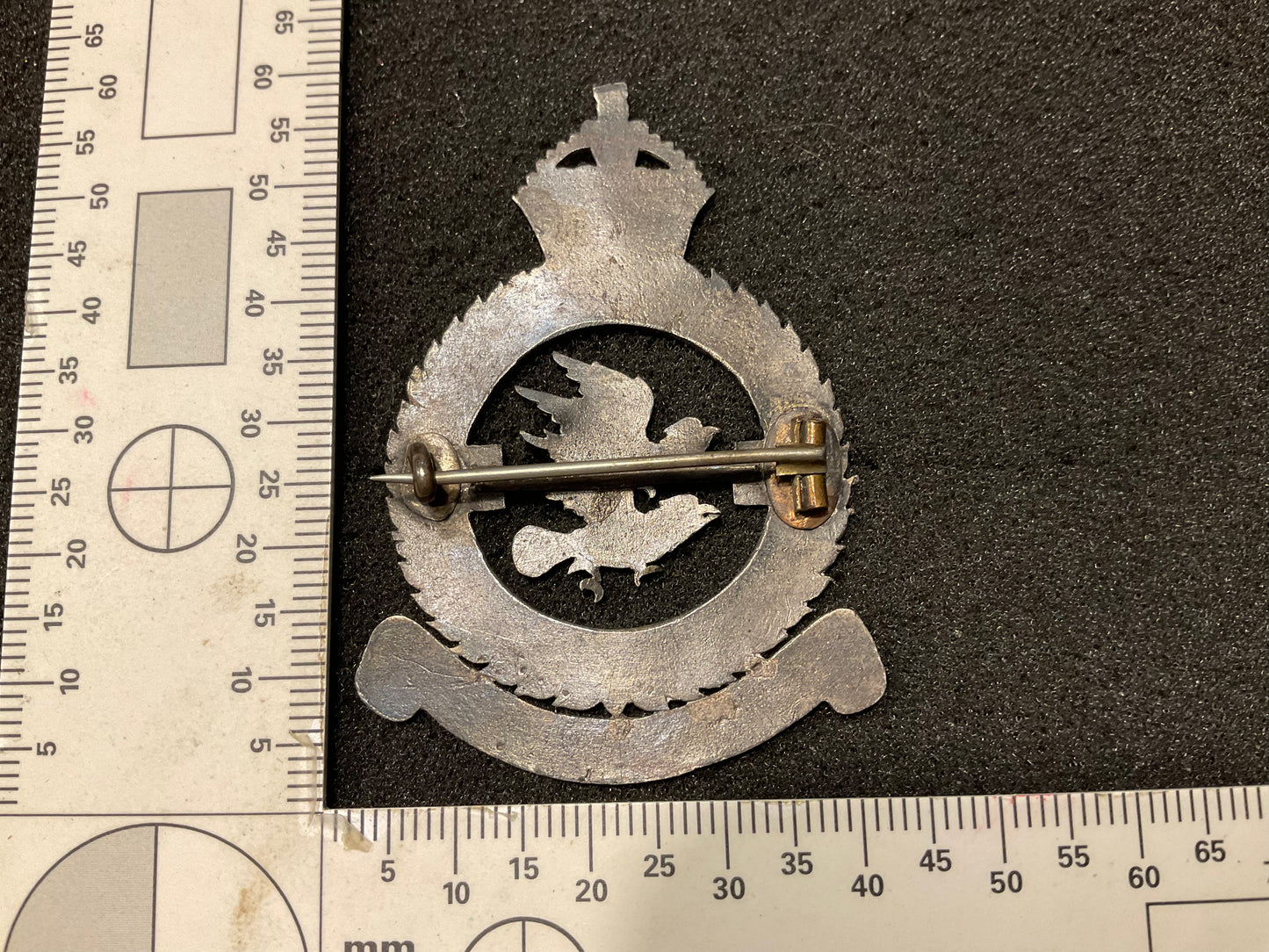 WW2 RAF No11 Bomber Squadron silver head dress badge ?