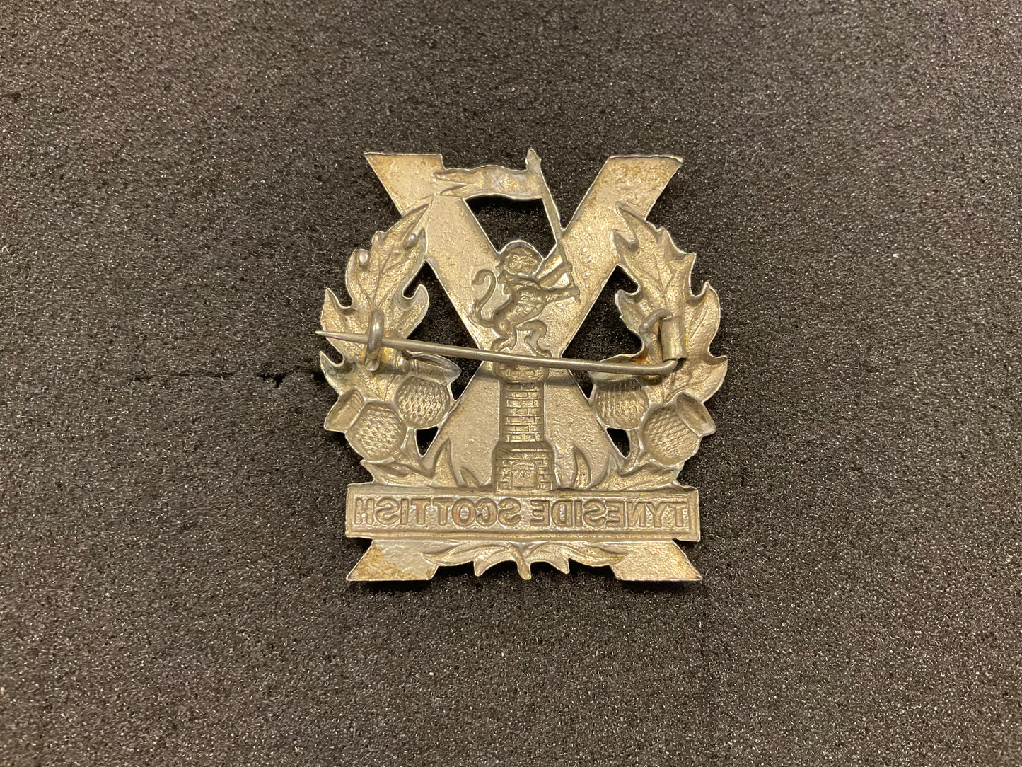 Tyneside Scottish Glengarry with full lion above tower.