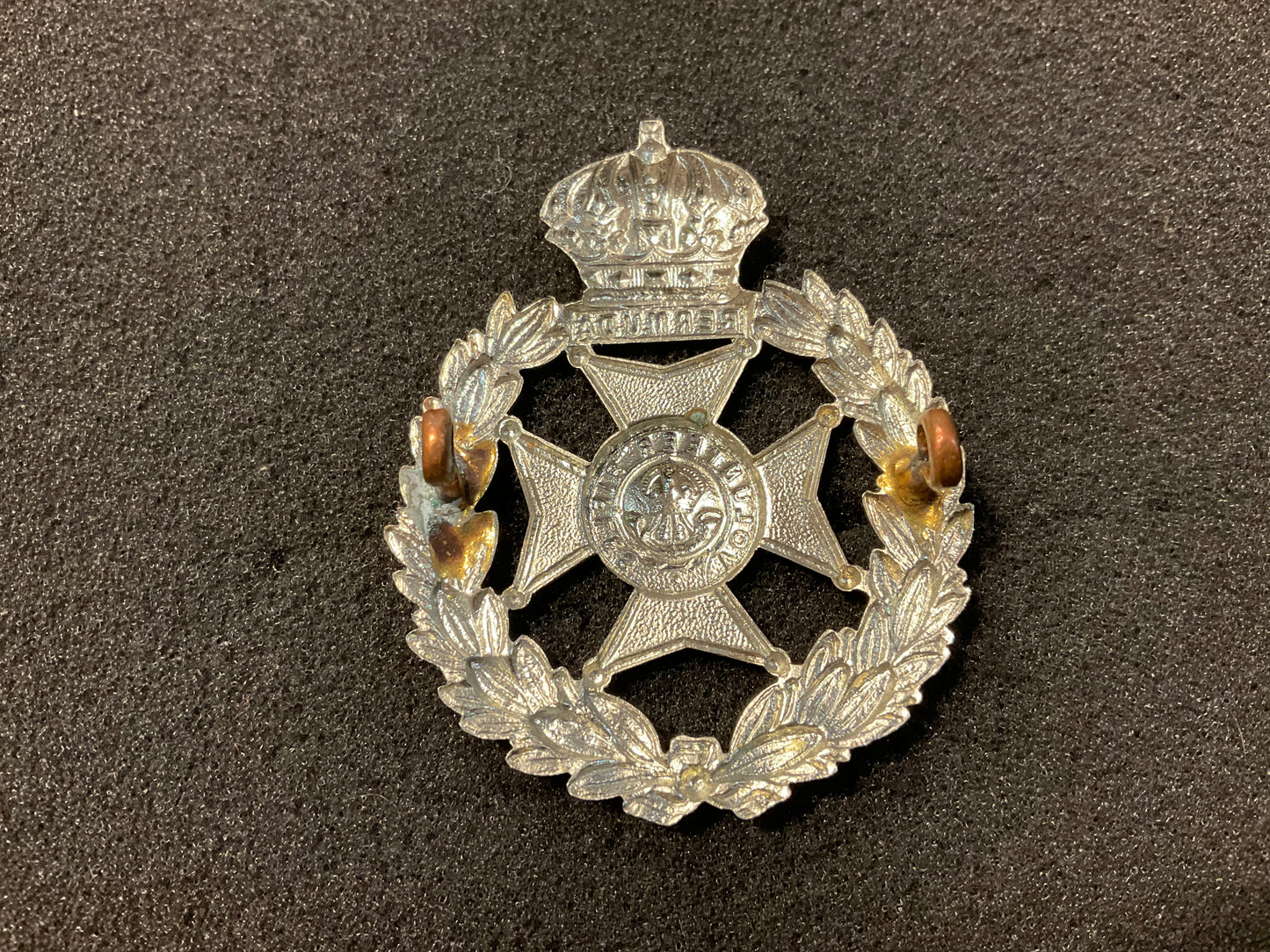 Bermuda Volunteers cap badge.