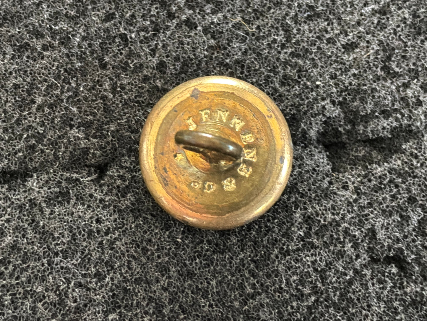 XLVII Silver & gilt 13mm button by Jennens.