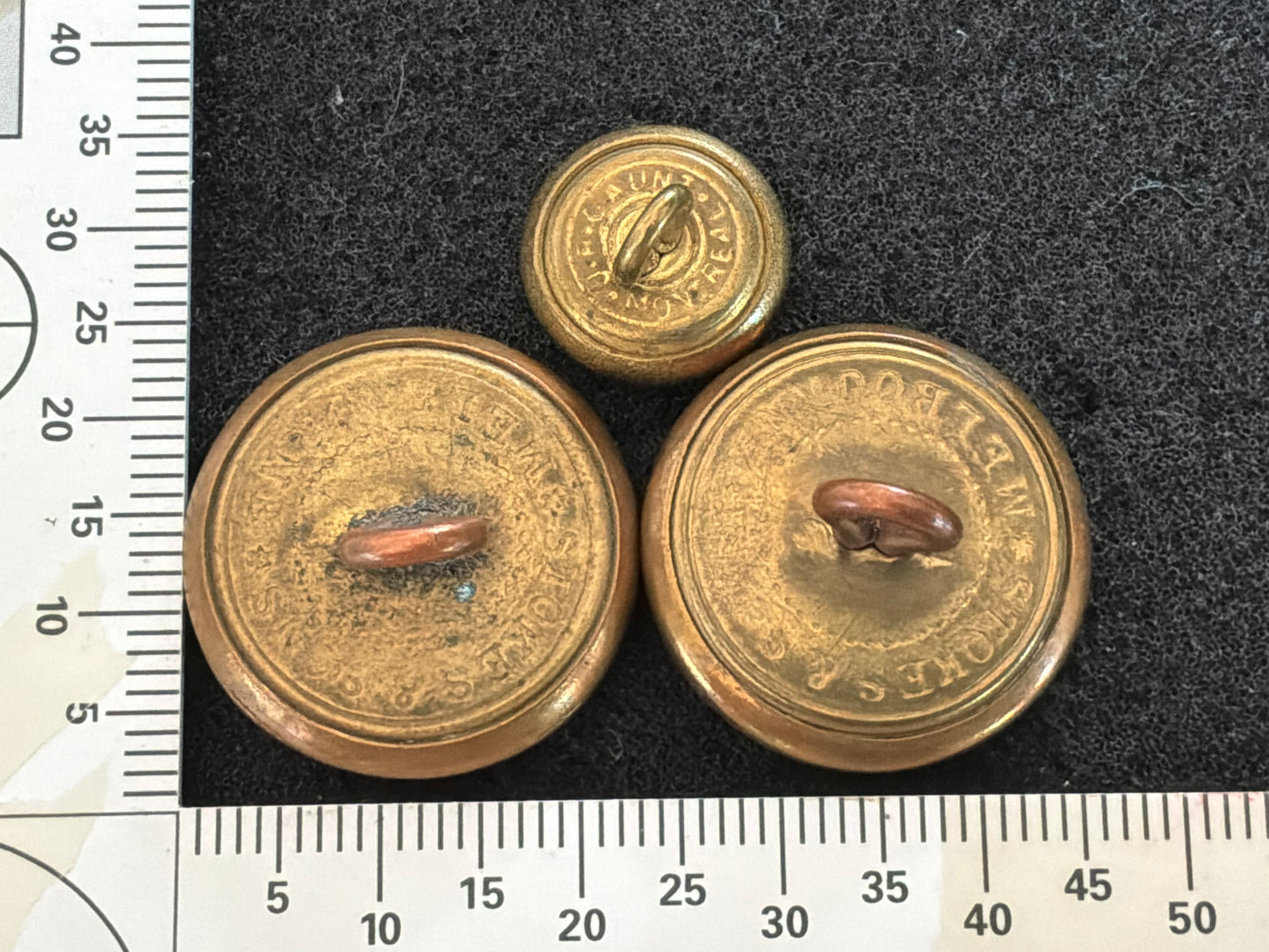 WW2 N.Z Air Force buttons- Stokes & Sons Melbourne and J.R. Gaunt Montreal.