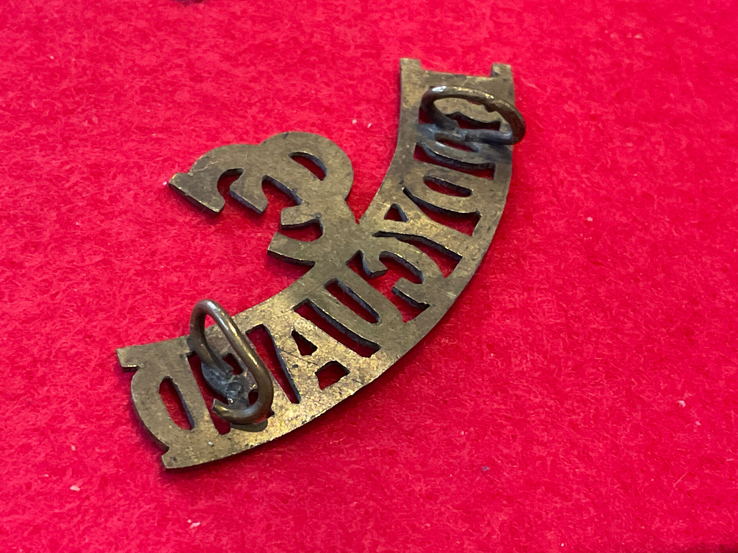 Boer War Commander in Chief’s Bodyguard brass shoulder title With brass wire loops.