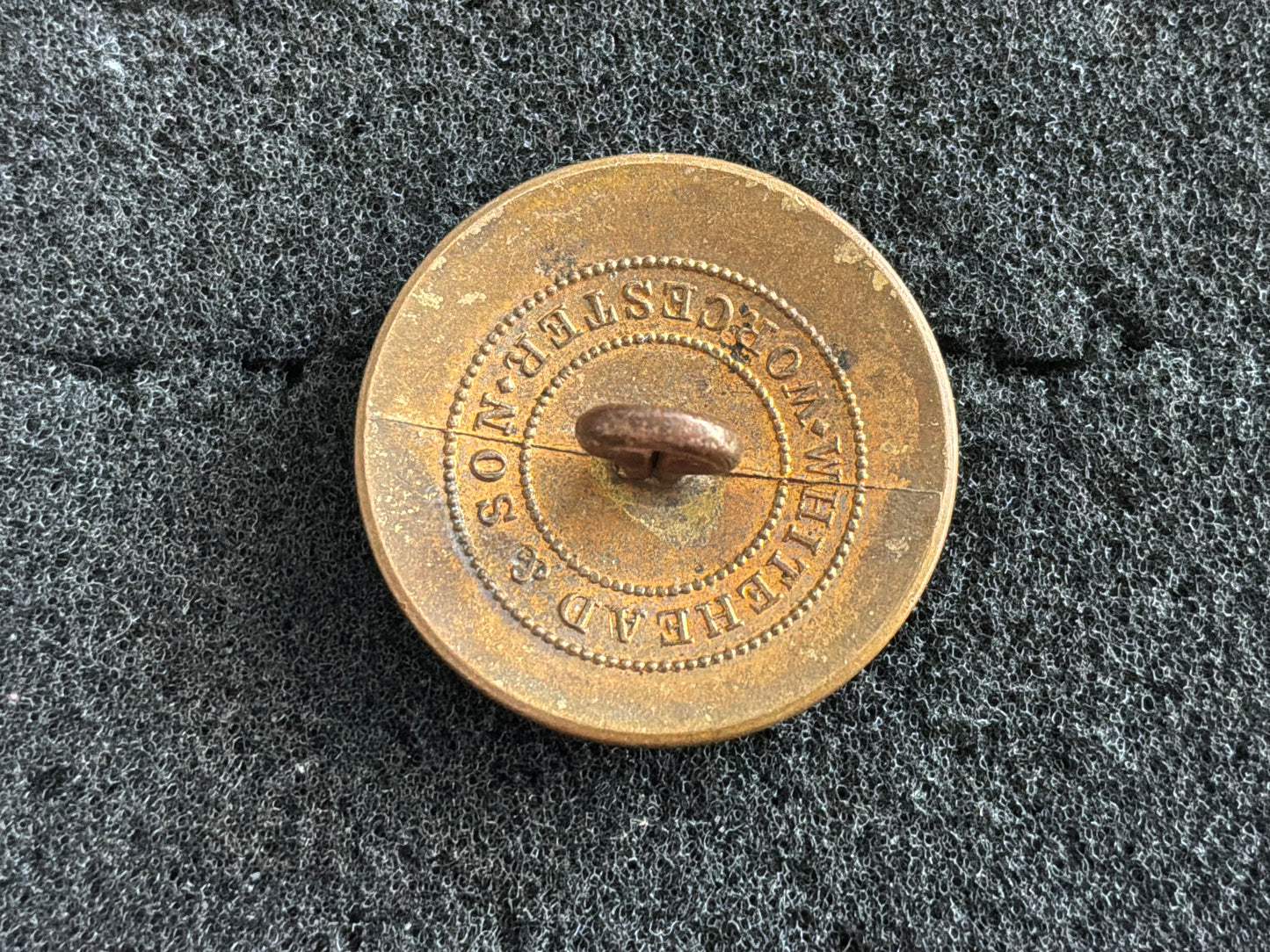 Early Mythical bird hunt/livery button by rare maker.