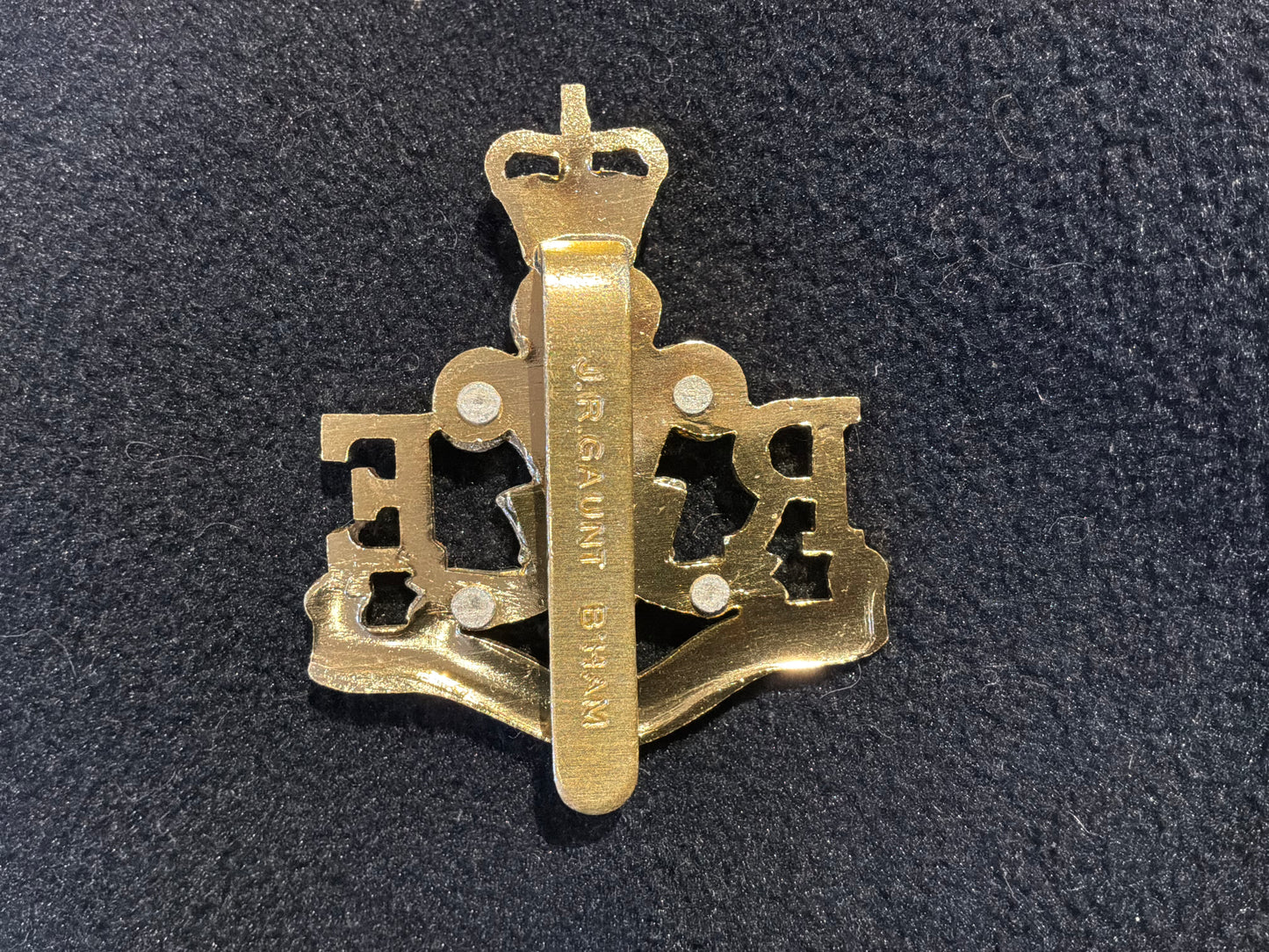 Anodised Royal Monmouthshire Royal Engineers (Militia) (TA) cap badge.