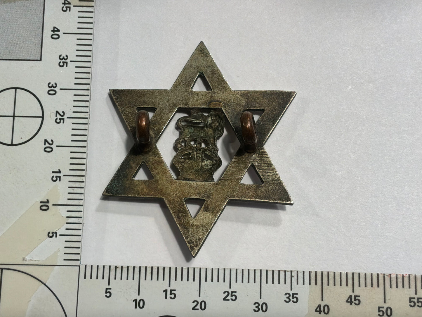 West Indies-Trinadad Police K/C cap badge.