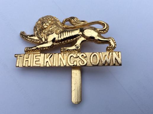 The Kings own royal regt A/A cap badge 