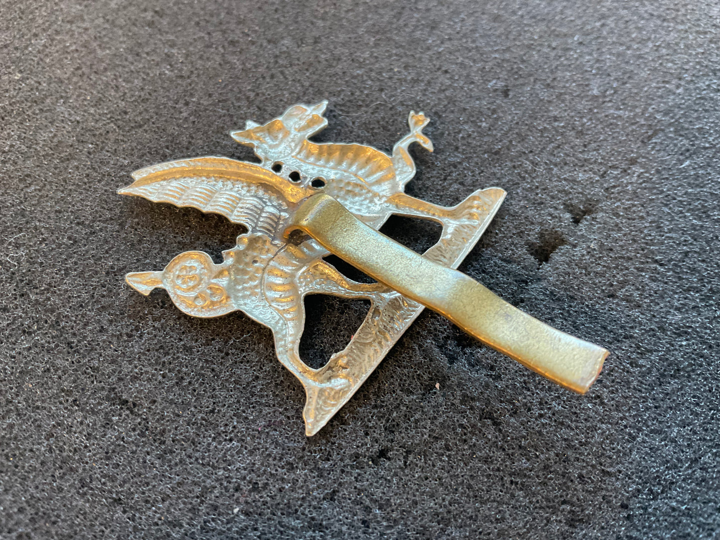 1st Battalion, Monmouthshire Regiment cap badge back