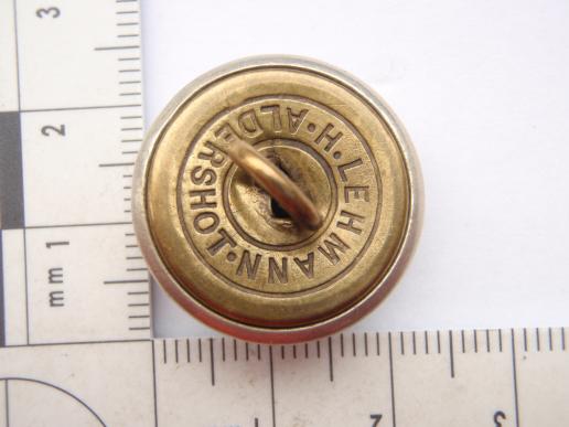 QVC The Queens Own O.Y.C button.