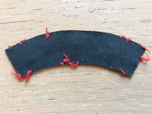 WW2 Printed QUEENS Shoulder title, removed from uniform