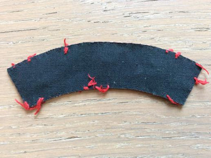 WW2 Printed QUEENS Shoulder title, removed from uniform
