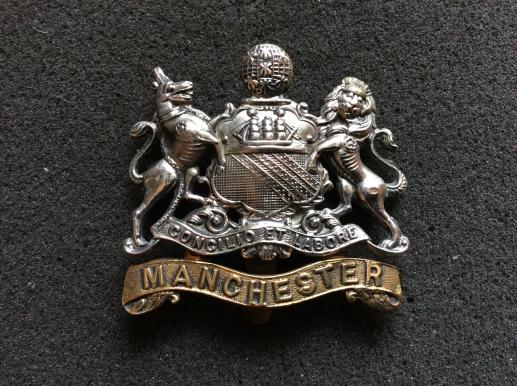 Gradia Militaria -  WW1 Manchester Regiment Other Ranks Cap badge