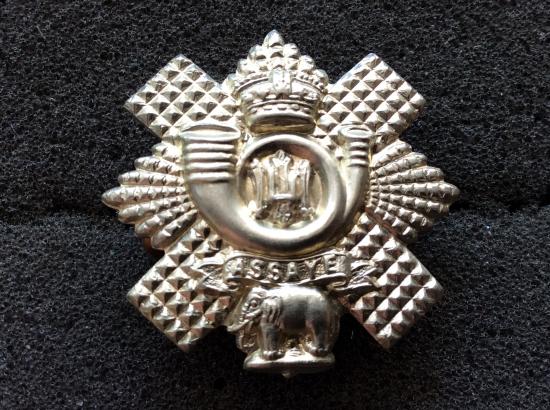 Gradia Militaria -  Q.V.C Highland Light Infantry w/m Collar Badge