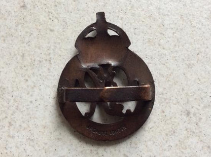 National Defence Company O.S.D cap badge