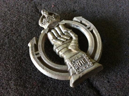 WW2 Economy plastic R.A.C ( Royal Armoured Corps) Cap badge