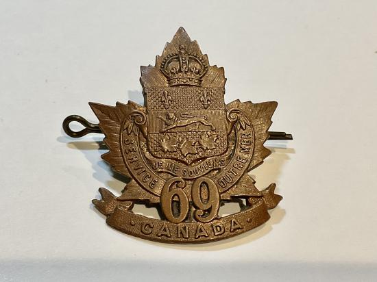Gradia Militaria -  WW1 C.E.F 69th Batt, (St. John, Quebec) cap badge