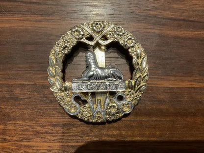 Gradia Militaria -  Anodised South Wales borders cap badge