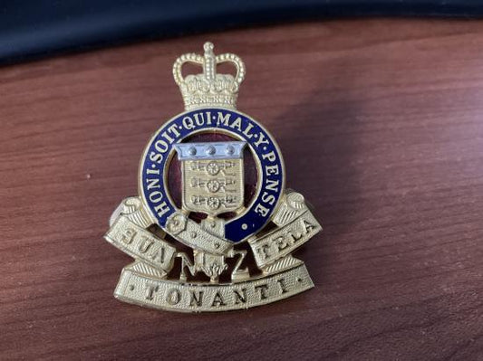 Gradia Militaria -  Officers R.N.Z.A.O.C gilt & enamel cap badge