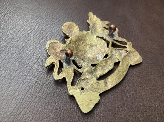 WW1 Egyptian made Manchester Regiment cap badge