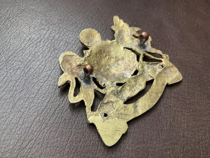 WW1 Egyptian made Manchester Regiment cap badge