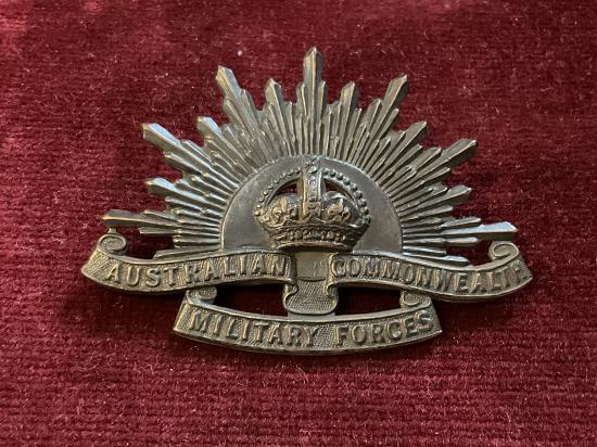 Gradia Militaria -  WW2 rising sun A.I.F cap badge by STOKES