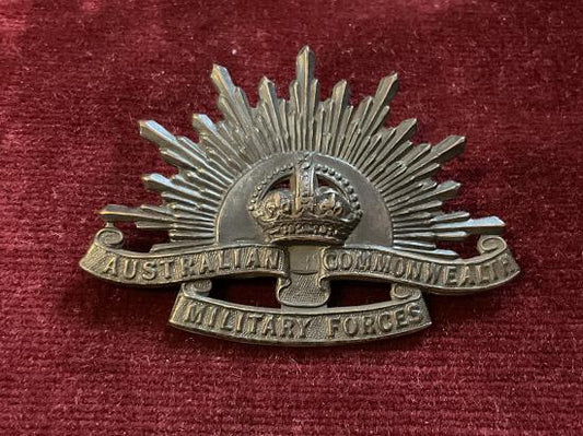 Gradia Militaria -  WW2 rising sun A.I.F cap badge by STOKES