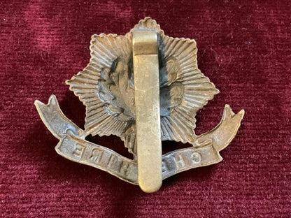 WW1 Cheshire regiment brass economy cap badge
