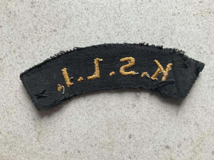 K.S.L.I cloth shoulder title, yellow on dark green backing