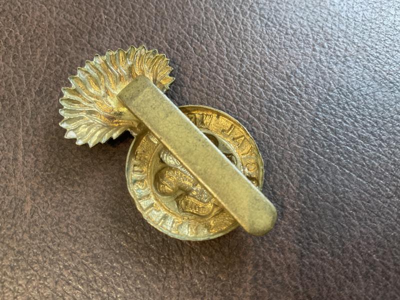 WW1 All brass economy Royal Welsh Fusiliers cap badge