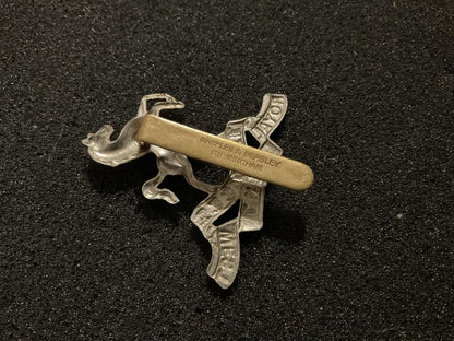 Royal West Kent Regiment cap badge by Marples