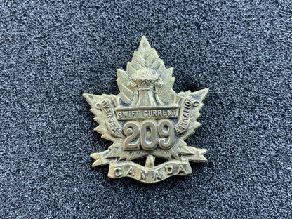 Gradia Militaria -  WW1 C.E.F 209th Batt (Swift Current Saskatchewan) collar badge