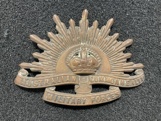 Gradia Militaria -  WW1/2 A.I.F Rising sun slouch hat badge by Stokes