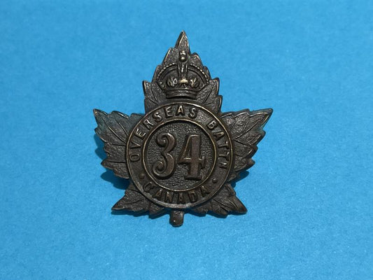 Gradia Militaria -  WW1 C.E.F 34th Infantry Overseas Battalion collar badge