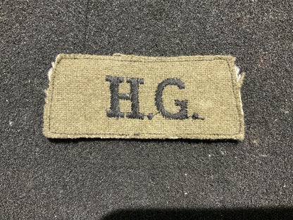 Gradia Militaria -  WW2 H.G (Home Guard) slip on shoulder title