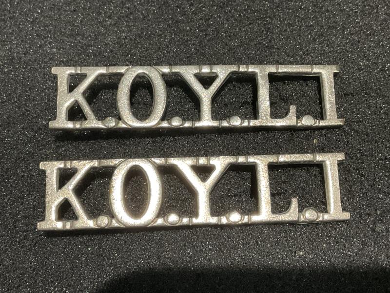 K.O.Y.L.I white metal shoulder titles