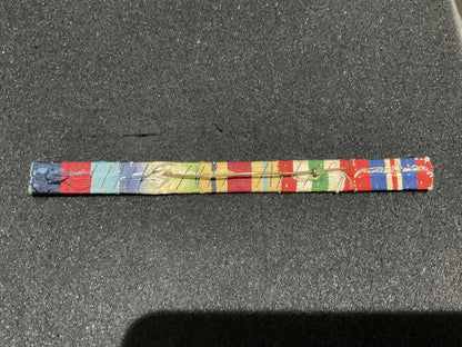 WW2 Medal ribbons mounted on metal bar