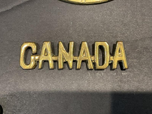 Gradia Militaria -  WW1 C.E.F voided CANADA shoulder title