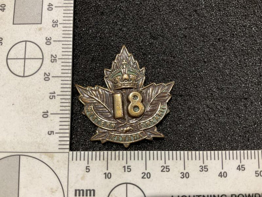 Gradia Militaria -  WW1 C.E.F 18th Infantry Battalion collar badge